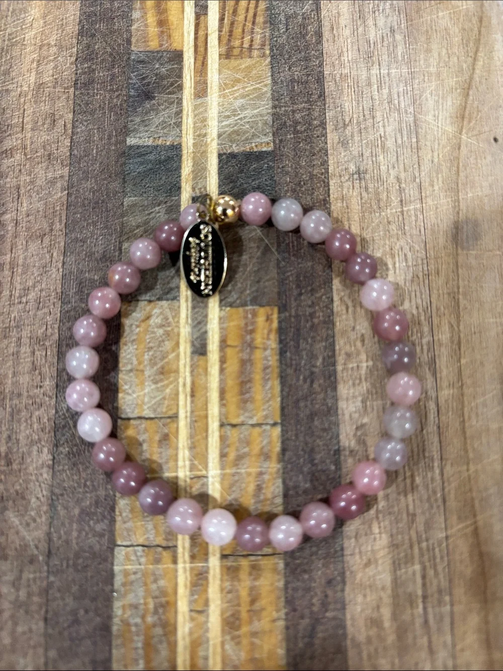 (3) beaded bracelets and (1) pair earrings